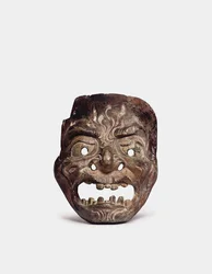 En Gigaku-mask i trä