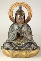 Buddhistisk abbot (lackerat trä)