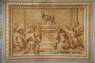 Falskt förgylld relief, med geten placerad på det historiserade altaret och omgiven av figurer i tillbedjan.