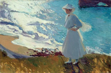 María på stranden i Biarritz eller Motljus