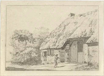 Man med en spade på en gård