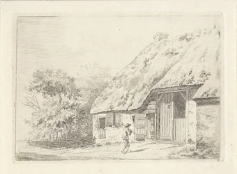 Man med en spade på en gård