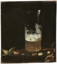 Stilleben med ölglas och nötter