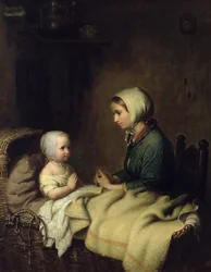 En liten flicka ber sina böner i sängen