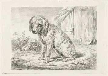 Sittande hund vid en lada