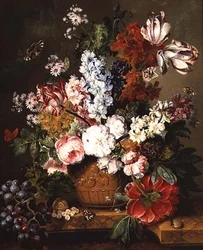 Frukt och blommor på en marmoravsats