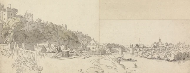 En stad sett från stranden av en flod