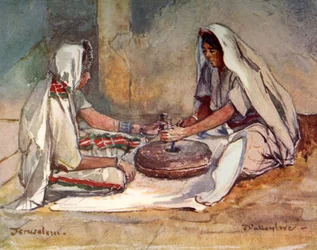 Två kvinnor som maler vid en handkvarn, 1902.