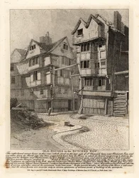 Gamla hus på Butcher Row i London. Hörnhuset till höger på St Clement