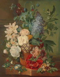 Blommor i en terrakottavas