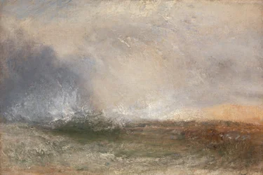 Stormigt hav som bryter på en strand