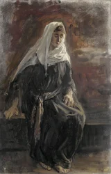 Sittande kvinna
