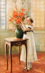 En ung flicka som ordnar vårblommor