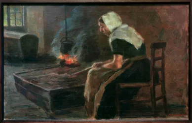 Kvinna vid öppen spis