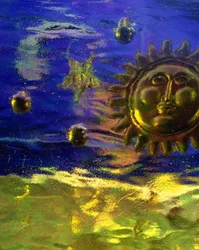 Blå och guld sol