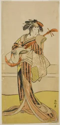 Skådespelaren Yamashita Mangiku I som Osan i pjäsen Kitekaeru Nishiki no Wakayaka, uppförd på Nakamura-teatern i den elfte månaden 1780