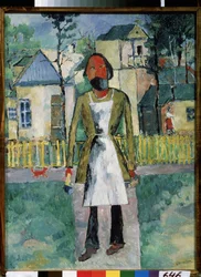 En snickare (A Carpenter). Hantverkaren står framför en by på landet, han är klädd i sitt arbetsförkläde och håller sina verktyg i var sin hand. Målning av Kasimir Severinovich Malevitch (Malevich, Malevic) (1878-1935), olja på trä