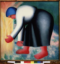 En skördare. Porträtt av en böjd barfota bondkvinna som skördar spannmål. Målning av Kasimir Severinovich Malevitch (Malevich, Malevic) (1878-1935), olja på trä