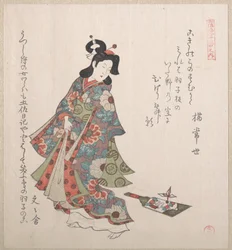 Flicka med en hagoita (japanskt slagträ och fjäderboll)