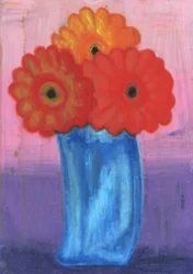 Färgglada blommor i blå vas