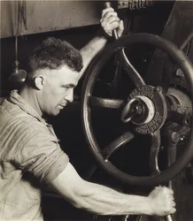 An Industrial Design: Pennsylvania Rubber Co. at the Control Wheel of a Great Calendar - Making Auto Tyres, 1920s, printed 1930s