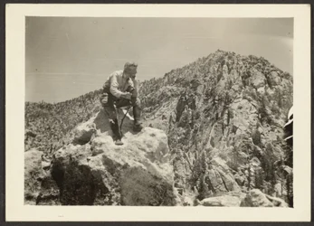 [Man Atop Rocks]