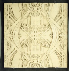 Ett takfragment, dekorerat med utarbetade rullar och bladverk, 1906-1908