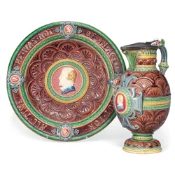 En Minton majolica ewer och stativ