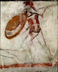 En krigare med ett spjut och en sköld. Lukansk fresk från 300-talet f.Kr. från Ryttarens grav i Paestum, Italien. Museo Nazionale Archeologico, Paestum