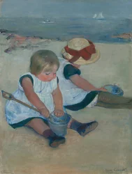 Barn som leker på stranden