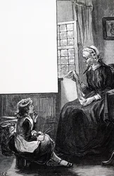 En mormor undersöker barnets ansträngningar att sticka