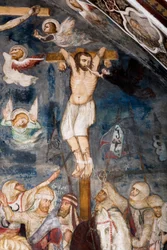 Den icke omvända tjuven, korsfäst med Jesus, hans själ slits ur hans mun av en demon. Representation av den onde tjuven kallar Gesmas eller Gestas. Fresk av Sacro Specos mästare. 1300-talet. Överlägsen kyrka. Klostret Saint Benedetto (Sacro Spec