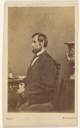 [Abraham Lincoln sittande, i profil]