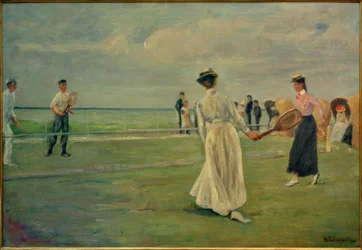 Tennisspelare vid havet