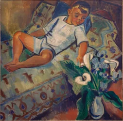 Liggande pojke