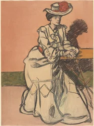 En elegant Parisiènne som sitter på ett kafé