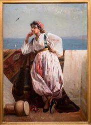 Ung orientalisk flicka på en terrass i Alger