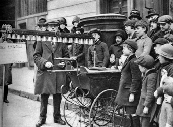 A bell busker, London, 1926-1927.