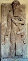 Mesopotamien: Staty av Sargon som betvingar ett lejon, kallad Gilgamesh, hovet i Khorsabad, 800-talet. Paris, Louvren