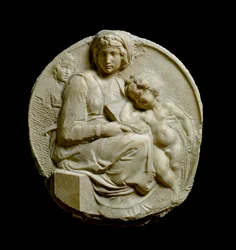 Jungfru och barn med Johannes döparen Madonna Pitti eller Tondo Pitti. Präglade marmorstrumpor av Michelangelo Buonarroti