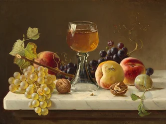 Marmorbordsskiva med frukt och vinglas