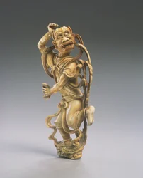 En figur av Kui xing (ristad elfenben) (se även 272115)