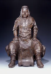 En fin stor tidig Ming bronsfigur av Guandi