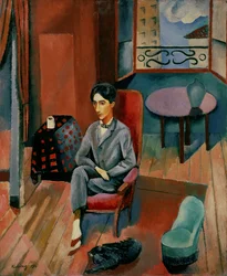 Porträtt av Jean Cocteau sittande i sin ateljé