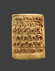 Hårkam dekorerad med rader av vilda djur, ca 3200–3100 f.Kr. (elfenben)