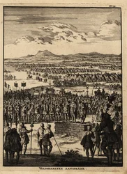 Romerska centurioner och legionärer lyssnar på ett tal.