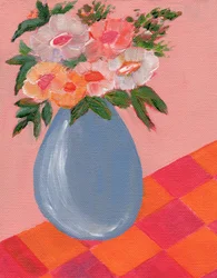 Färgglada blommor i en blå vas