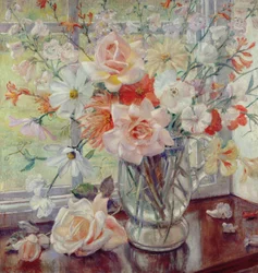 Ett stilleben av sommarblommor i en glaskanna