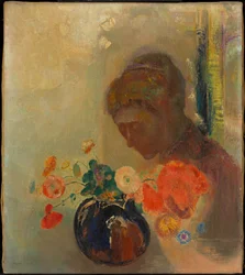 Kvinna med en vas blommor