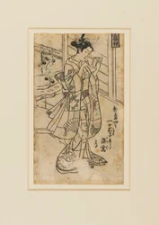Träblockstryck - Onoe Kikingoro I som kvinna som läser en bok, 1700-tal